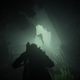 Underwater, Joel sees Ellie framed by light in the distance in a moment from the game The Last of Us.